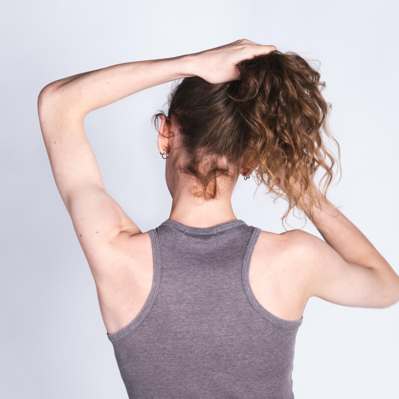 An ink drawing of a barren tree with monkeys in its branches